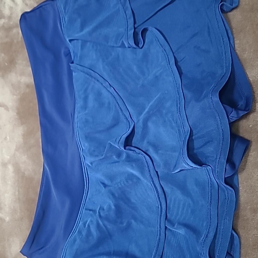 Ladies skorts ruffle, swimsuit bottom or cover up.